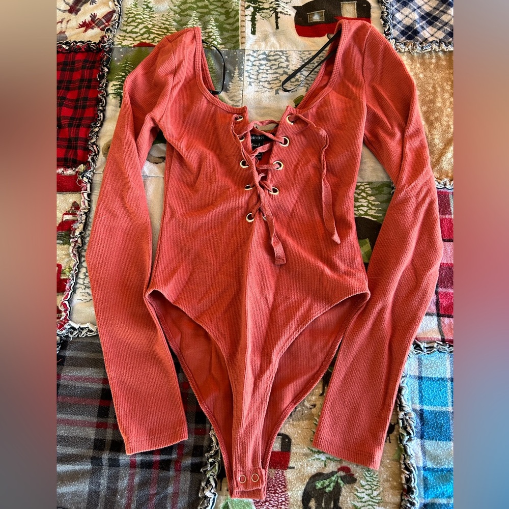 Orange bodysuit